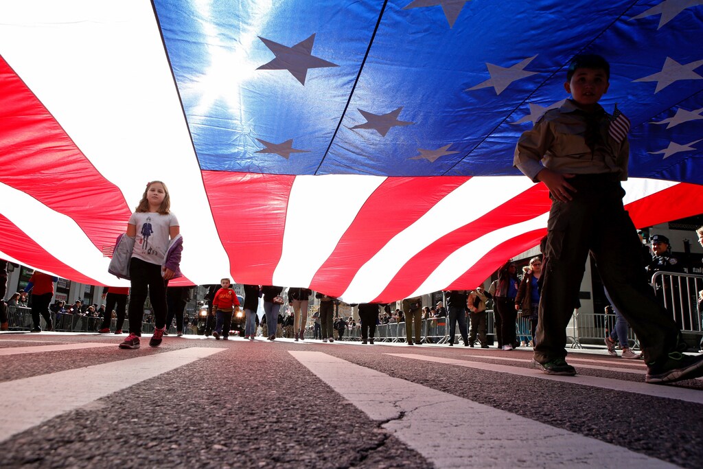Children march during the Veteran's Day parade in New York, U.S., November 11, 2016. REUTERS/Eduardo Munoz TPX IMAGES OF THE DAY - RTX2T9CL