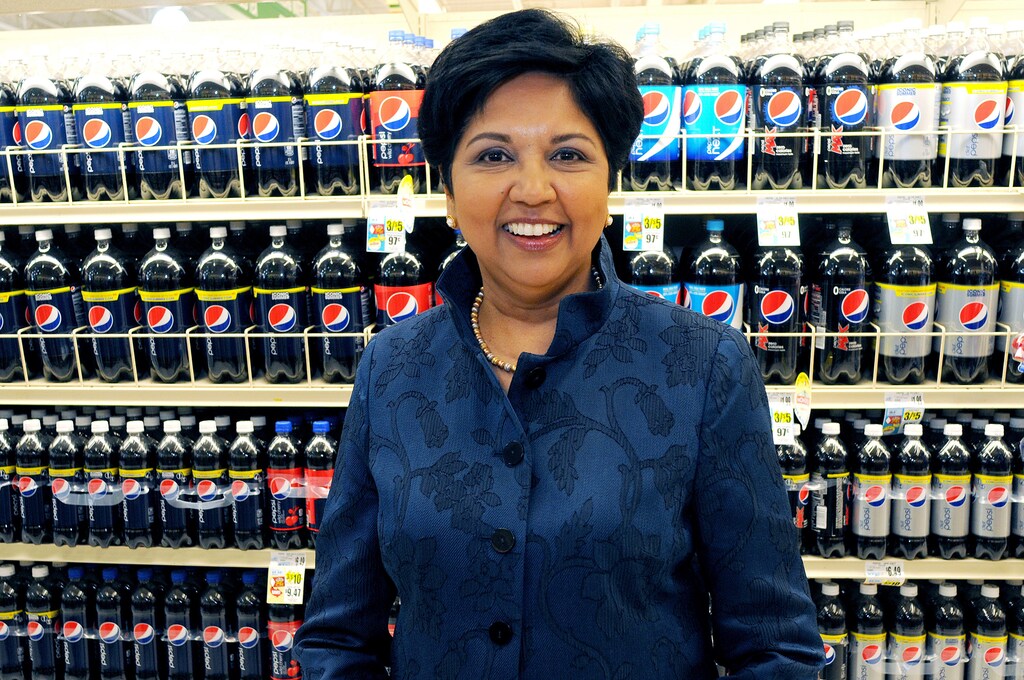 PepsiCo CEO Indra Nooyi poses for a portrait by products at the Tops SuperMarket in Batavia, New York, U.S. on June 3, 2013. REUTERS/Don Heupel/File Photo - TM3EC8V1CL301