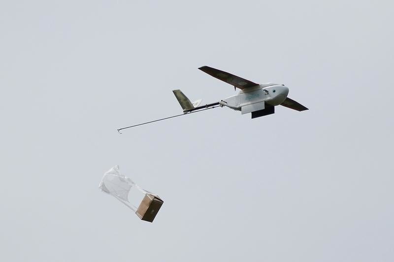 A Zipline delivery drone releases its payload midair during a flight demonstration at an undisclosed location in the San Francisco Bay Area, California, U.S., May 5, 2016. REUTERS/Stephen Lam TPX IMAGES OF THE DAY - S1AETDANKSAA