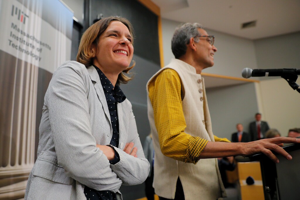 Abhijit Banerjee and Esther Duflo, two of the three winners of the 2019 Nobel Prize in Economics, speak at news conference at the Massachusetts Institute of Technology (MIT) in Cambridge, Massachusetts, U.S., October 14, 2019. REUTERS/Brian Snyder - RC1CD69EB330