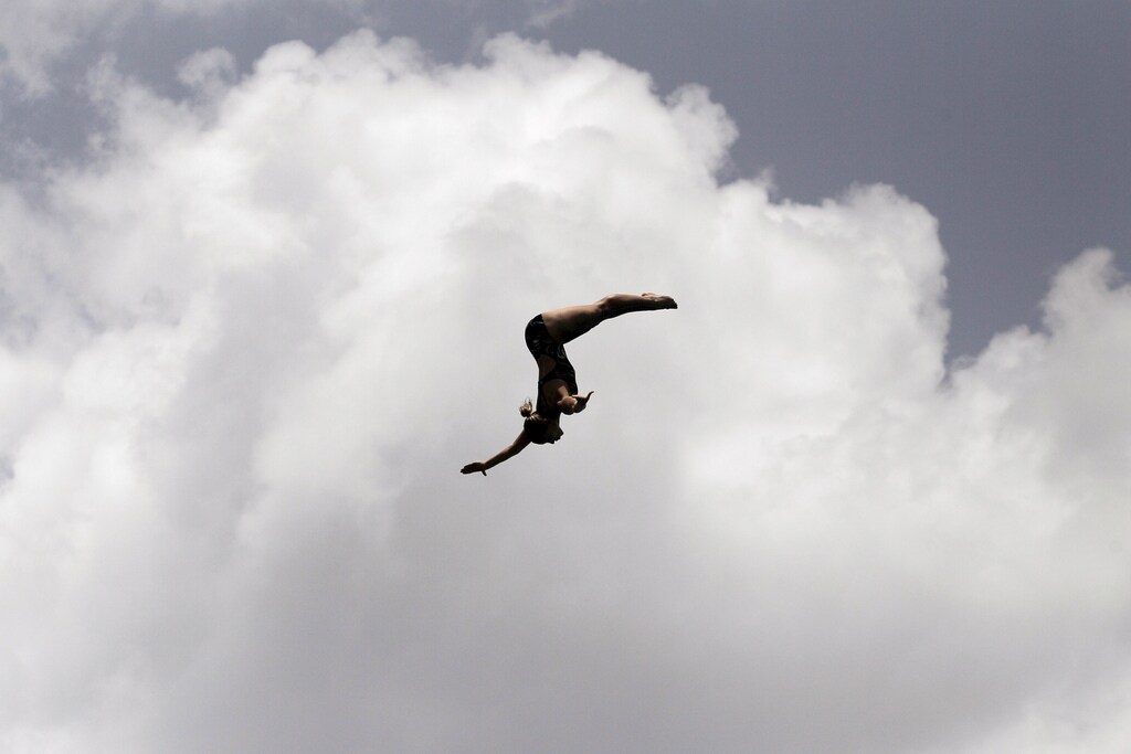 Tara Hyer-Tira from the U.S. performs a high dive during the second FINA High Diving World Cup in Cozumel, Mexico, May 9, 2015. REUTERS/Victor Ruiz Garcia TPX IMAGES OF THE DAY - GF10000089883