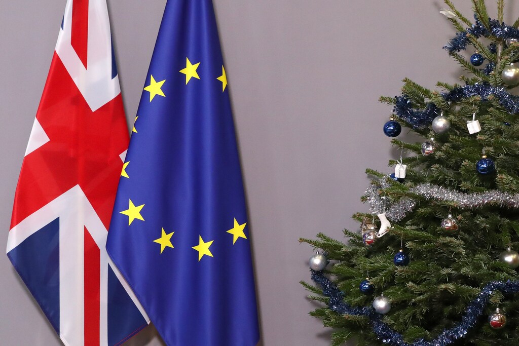 British and European Union flags are seen next to Christmas tree before arrival of British Prime Minister Theresa May to meet European Council President Donald Tusk, at the EU Council headquarters in Brussels, Belgium December 11, 2018. REUTERS/Yves Herman - RC1C3F63CB50