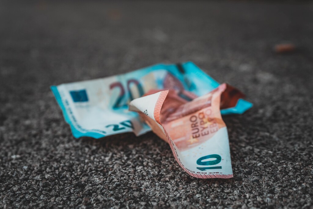 A crushed up 10 and 20 euro note.
