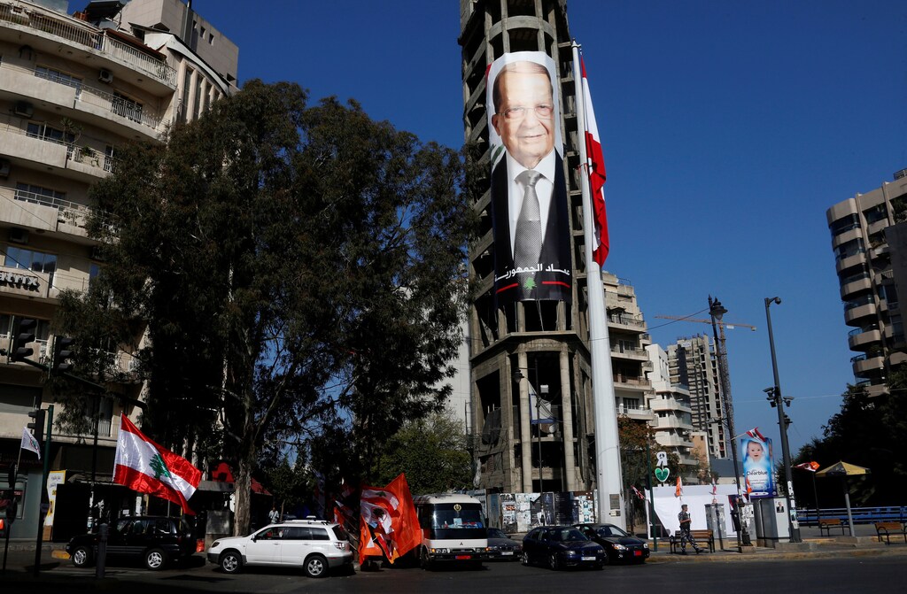 A picture of Christian politician and FPM founder Michel Aoun is seen on a building prior to presidential elections in Beirut, Lebanon October 30, 2016. REUTERS/Mohamed Azakir - RTX2R2GQ