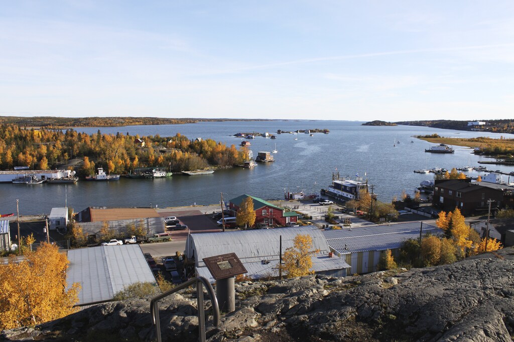 Great Slave Lake and Jolliffe Island are seen from the Pilot Monument in Yellowknife, Northwest Territories, in this picture taken September 22, 2015. Each winter, in the far reaches of Canada's north, a highway of ice built atop frozen lakes and tundra acts as a supply lifeline to remote diamond mines, bustling with traffic for a couple of months before melting away in the spring. Due to unseasonably warm weather, this year the world's busiest ice road is running late. Picture taken on September 22, 2015. REUTERS/Susan Taylor - TM3EBAF1BRF01