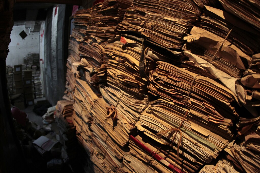 Documents are seen at the national police archives, which houses more than 80 million pages of official police records, in Guatemala City October 21, 2011.Three historic cases are now being processed using material from the archive, which houses 80 million pages of official police paperwork stretching back to the 1800s, and hundreds of other prosecutions could follow. Picture taken October 21, 2011. To match GUATEMALA-ARCHIVES/ REUTERS/Jorge Dan Lopez (GUATEMALA - Tags: POLITICS CRIME LAW) - GM1E8290JEY01