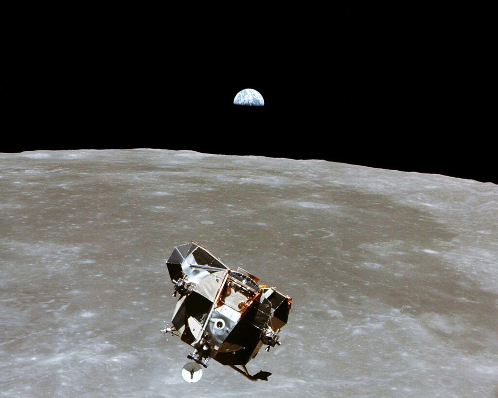 - FILE PHOTO JULY 1969 - The Apollo 11 Lunar Module ascent stage, with astronauts Neil A. Armstrong and Edwin E. Aldrin Jr. aboard, is photographed from the Command and Service Modules in lunar orbit in this July, 1969 file photo. Astronaut Michael Collins, command module pilot, remained with the Command/Service Module in lunar orbit while Armstrong and Aldrin explored the Moon. The 30th anniversary of the Apollo 11 mission is July 16 (launch) and July 20 (landing on the moon) - RTXJ3D5