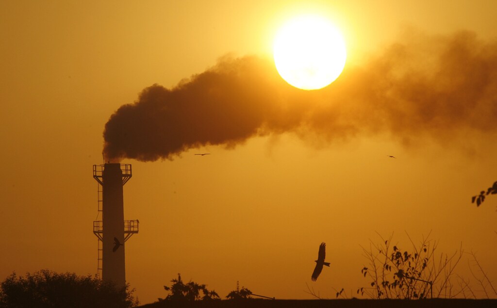 Smoke rises from a chimney of a garbage processing plant on the outskirts of the northern Indian city of Chandigarh.