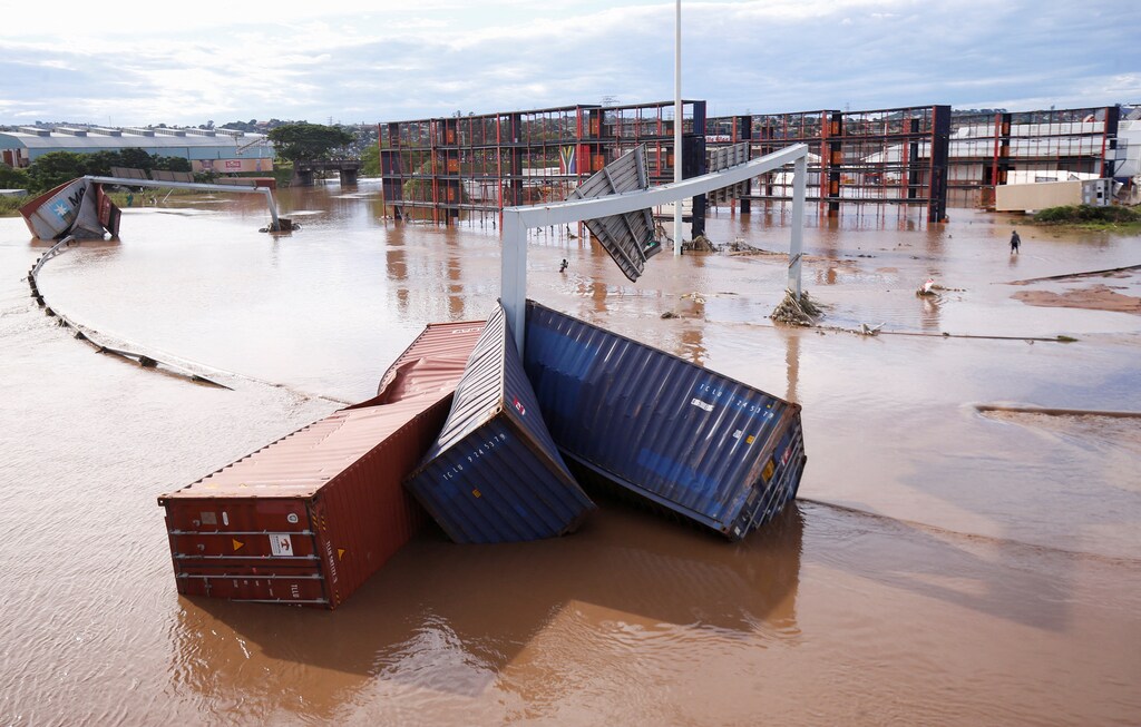 A view of shipping containers, which were washed away after heavy rains caused flooding, in Durban, South Africa, April 12, 2022. Climate change is likely to cause more flooding as the century progresses.