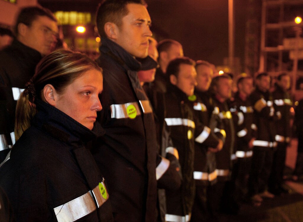 British firefighters at Cowcaddens station in Glasgow begin their strike, November 13, 2002. Firefighters began a 48-hour strike for more pay at 1800 GMT on Wednesday for the first time in a quarter of a century but promised emergency cover in the event of a catastrophic incident as Britain goes on heightened terror alert in the run-up to [Christmas]. - RTXLMLZ