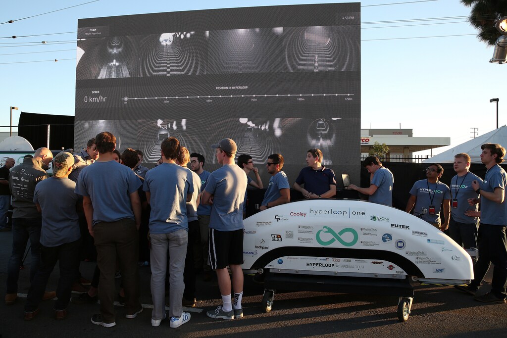 Team members from Hyperloop at Virginia Tech wait with their pod during the SpaceX Hyperloop Pod Competition in Hawthorne, Los Angeles, California, U.S., January 29, 2017. REUTERS/Monica Almeida - RTSY02V