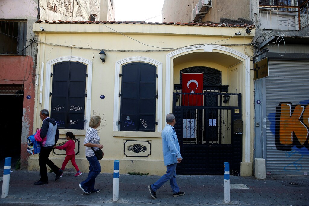 People walk in front of the Resurrection Church, known as Dirilis Kilisesi in Izmir, Turkey October 11, 2018. REUTERS/Osman Orsal