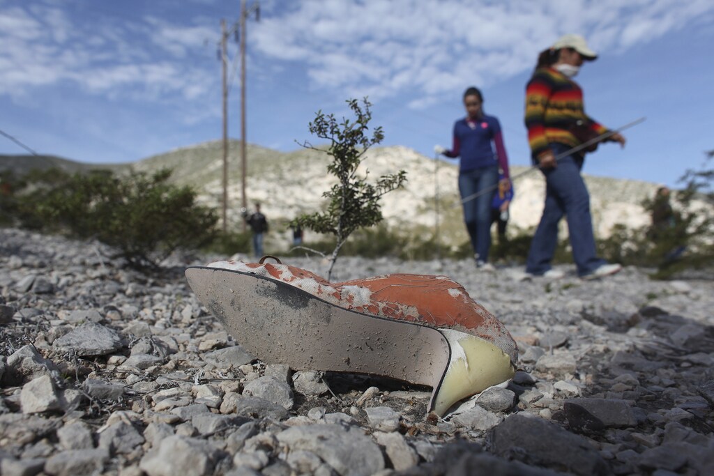 Women take part in the search of missing persons in an area near the village of La Union, on the outskirts of Torreon, in the Mexican state of Coahuila February 21, 2015. For the past two months, relatives of missing people in the Mexican city of Torreon have met every Saturday to personally look for missing relatives after the city was severely hit by an increase in murders, due to an intense struggle between rival drug gangs. The Zetas cartel arrived in Torreon in mid-2007 and started battling against the Sinaloa cartel for control over this centre of manufacturing, mining and farming once seen as a model for progress, which then became one of Mexico's most dangerous cities. Picture taken February 21, 2015.