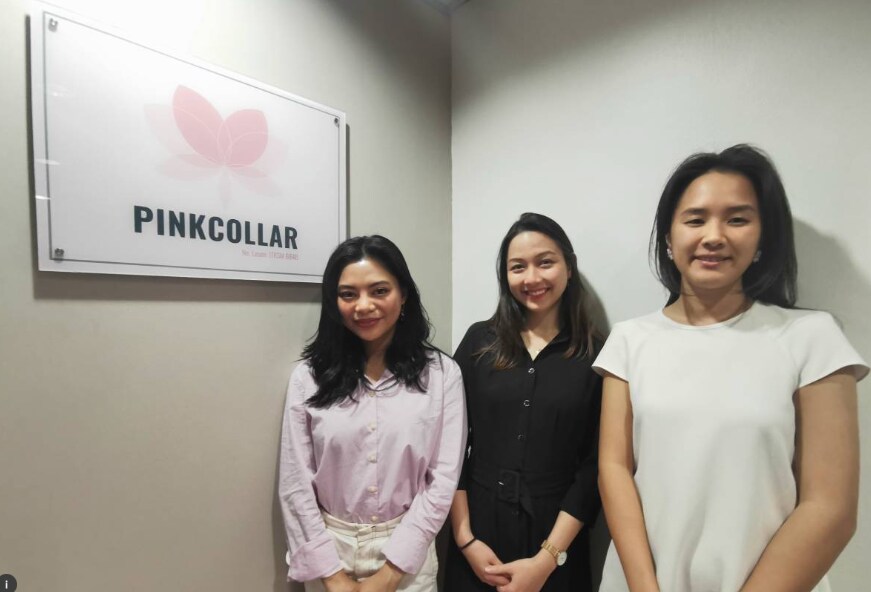 The founding team of Pinkcollar, which billed itself as Malaysia's first ethical recruitment agency aimed at tackling debt bondage among migrant domestic workers, pose for a photo at its office in Kuala Lumpur, Malaysia October 3, 2019.