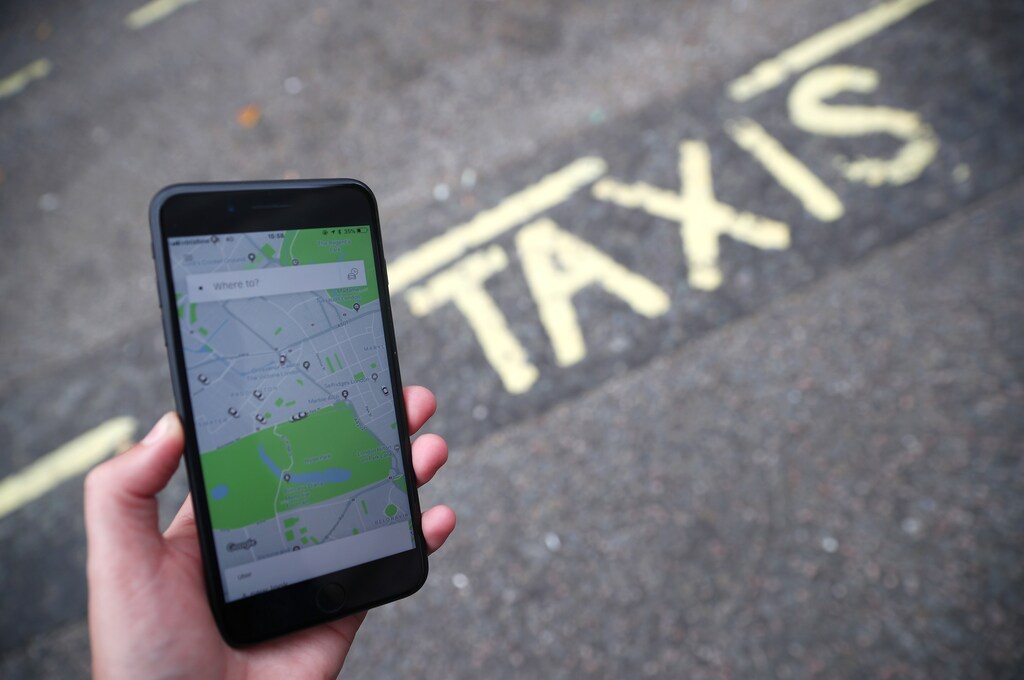 The Uber application is seen on a mobile phone in London, Britain, September 14, 2018. REUTERS/Hannah McKay - RC18E63124E0