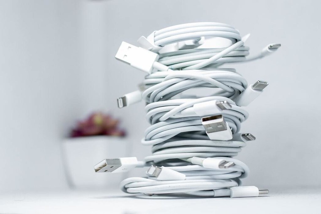 Charging wires are pictured tangled up.