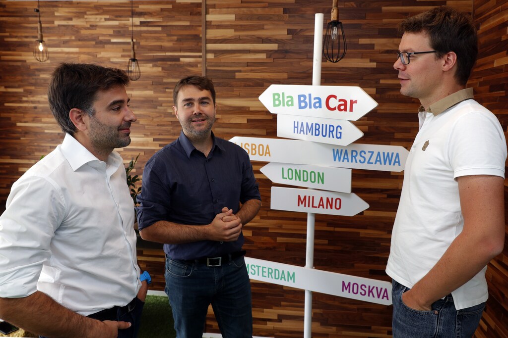 Frederic Mazzella (C), Founder and Chief Executive Officer of French ride-sharing start-up BlaBlaCar, Nicolas Brusson (L), Co-Founder and COO of BlaBlaCar, and Francis Nappez (R), Co-Founder and CTO of BlaBlaCar, poses at the company's headquarters in Paris, France, September 28, 2016. REUTERS/Philippe Wojazer - RTSPVRZ