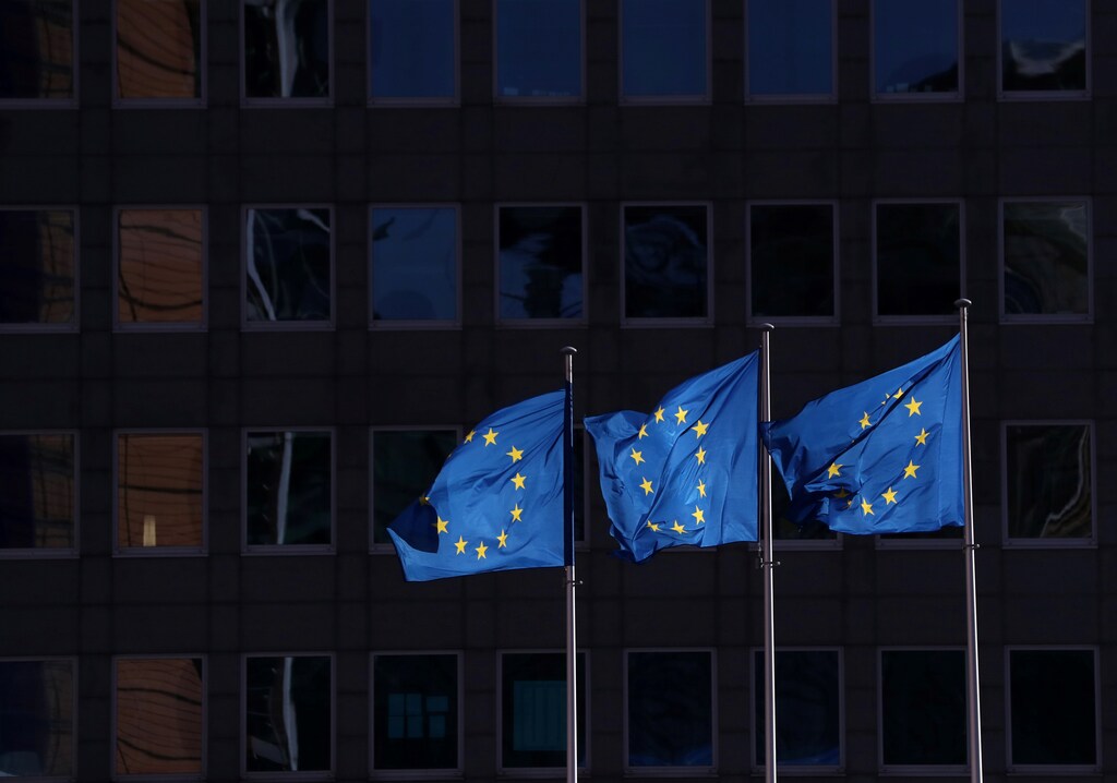European Union flags fly outside the European Commission headquarters in Brussels, Belgium, February 19, 2020.