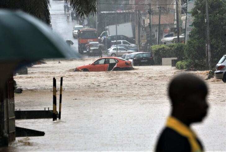 A flooded street is seen in Palmeraie, a neighbourhood of Abidjan, Ivory Coast, June 25, 2020. REUTERS/Thierry Gouegnon