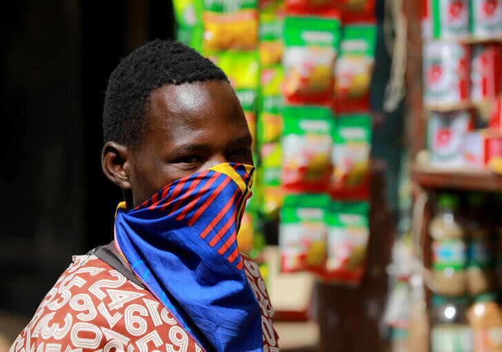 A man wears a face mask at Dutse Alhaji market, as authorities race to contain the coronavirus disease (COVID-19) in Abuja, Nigeria May 2, 2020. REUTERS/Afolabi Sotunde