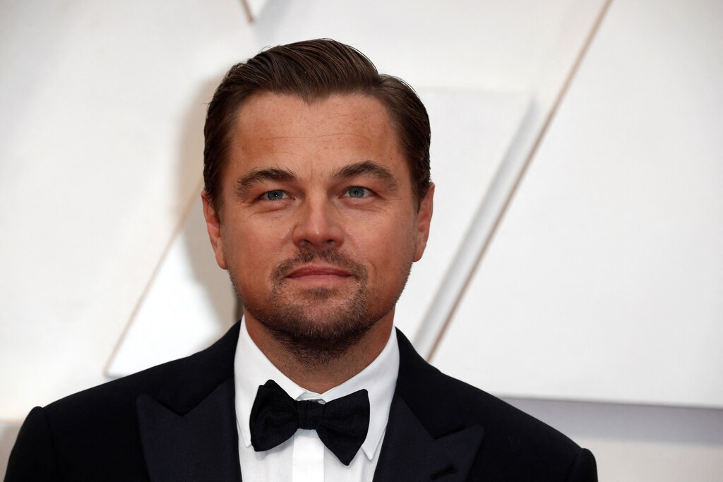 FILE PHOTO: Leonardo DiCaprio poses on the red carpet during the Oscars arrivals at the 92nd Academy Awards in Hollywood, Los Angeles, California, U.S., February 9, 2020. REUTERS/Eric Gaillard/File Photo