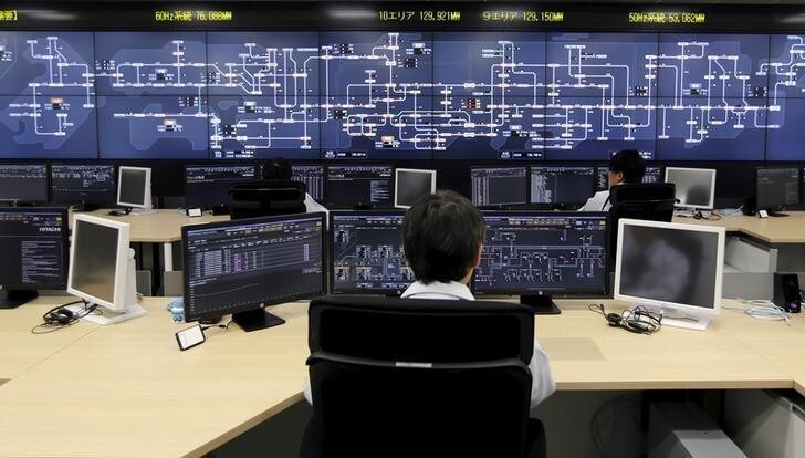 Staff work at the operations room of the Organization for Cross-regional Coordination of Transmission Operators, Japan (OCCTO) in Tokyo, Japan, March 16, 2016. Picture taken March 16, 2016. REUTERS/Toru Hanai