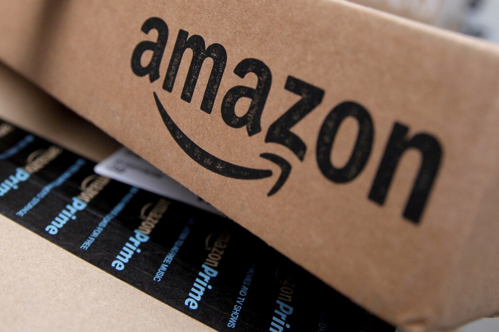 Amazon boxes are seen stacked for delivery in the Manhattan borough of New York City, January 29, 2016. REUTERS/Mike Segar/File Photo - TM3ECAR1GLA01