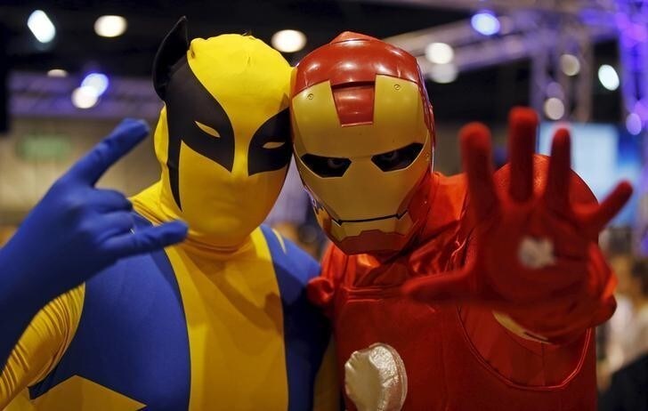 Participants wearing superhero costumes pose for a picture during the second edition of the Hero Festival in Marseille, France November 7, 2015. The festival is dedicated to American superhero comics, Japanese mangas, heroic fantasy characters and video games universes. REUTERS/Jean-Paul Pelissier