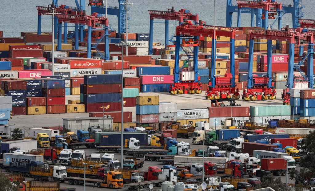 Shipping containers are seen stacked at Beirut's port, during a countrywide lockdown to prevent the spread of the coronavirus disease (COVID-19) in Beirut, Lebanon, April 8, 2020. REUTERS/Mohamed Azakir - RC2C0G960POX