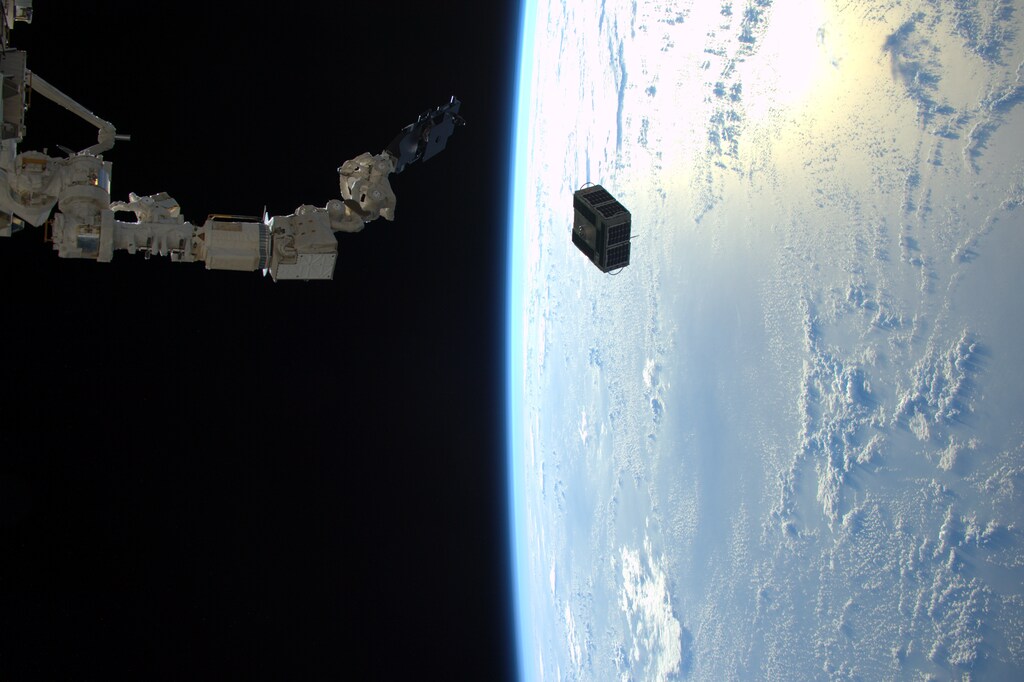 The robotic arm in Japan's Kibo laboratory successfully deploys two combined satellites from Texas universities from the International Space Station, January 29, 2016. The pair of satellites -- AggieSat4 built by Texas A&M University students, and BEVO-2 built by University of Texas students -- together form the Low Earth Orbiting Navigation Experiment for Spacecraft Testing Autonomous Rendezvous and Docking (LONESTAR) investigation. REUTERS/NASA/Tim Peake/Handout ATTENTION EDITORS - FOR EDITORIAL USE ONLY. NOT FOR SALE FOR MARKETING OR ADVERTISING CAMPAIGNS. THIS PICTURE WAS PROVIDED BY A THIRD PARTY. REUTERS IS UNABLE TO INDEPENDENTLY VERIFY THE AUTHENTICITY, CONTENT, LOCATION OR DATE OF THIS IMAGE. THIS PICTURE IS DISTRIBUTED EXACTLY AS RECEIVED BY REUTERS, AS A SERVICE TO CLIENTS - TM3EC311KOA01