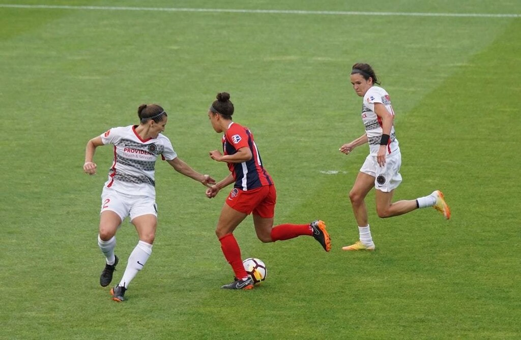 image of women playing football