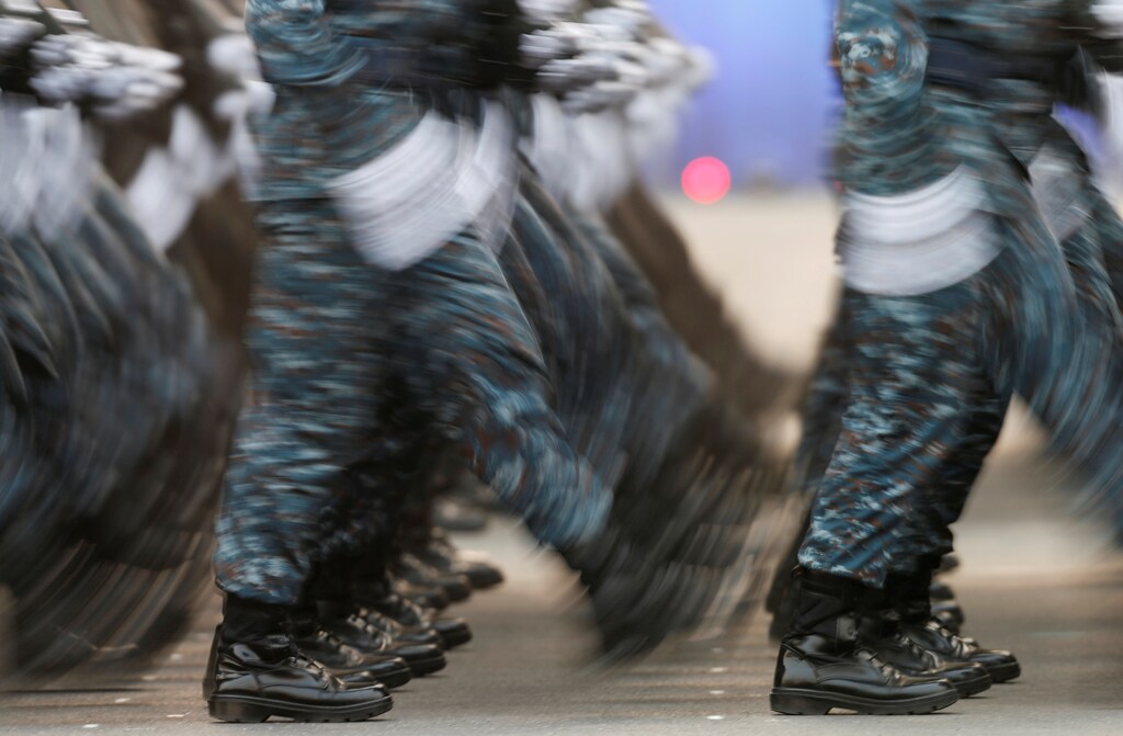 Soldiers march during the annual Military Parade to celebrate the Coronation of King Rama X at the Royal Thai Army Cavalry Center in Saraburi province, Thailand January 18, 2020. REUTERS/Soe Zeya Tun TPX IMAGES OF THE DAY - RC2GIE9ORVLN