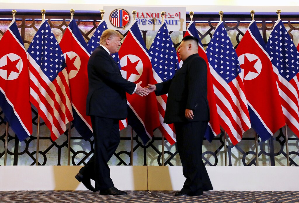 North Korea's leader Kim Jong Un walks with U.S. President Donald Trump during the second North Korea-U.S. summit in Hanoi, Vietnam, in this photo released on March 1, 2019 by North Korea's Korean Central News Agency (KCNA). KCNA via REUTERS ATTENTION EDITORS - THIS IMAGE WAS PROVIDED BY A THIRD PARTY. REUTERS IS UNABLE TO INDEPENDENTLY VERIFY THIS IMAGE. NO THIRD PARTY SALES. SOUTH KOREA OUT. NO COMMERCIAL OR EDITORIAL SALES IN SOUTH KOREA. - RC1B02ED9E00