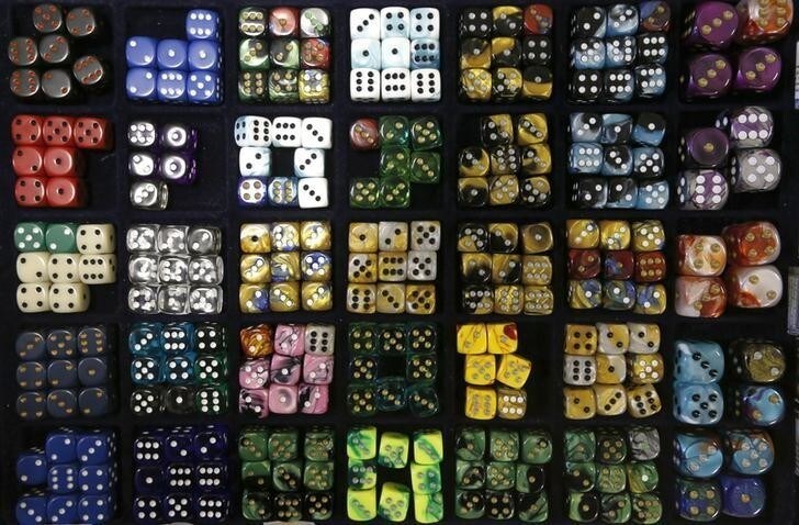 Sets of dice are seen on display during a board games festival in St. Petersburg, April 20, 2014. The festival was organised by vendors of board games to encourage young people to use and buy their products. REUTERS/Alexander Demianchuk (RUSSIA - Tags: BUSINESS SOCIETY)