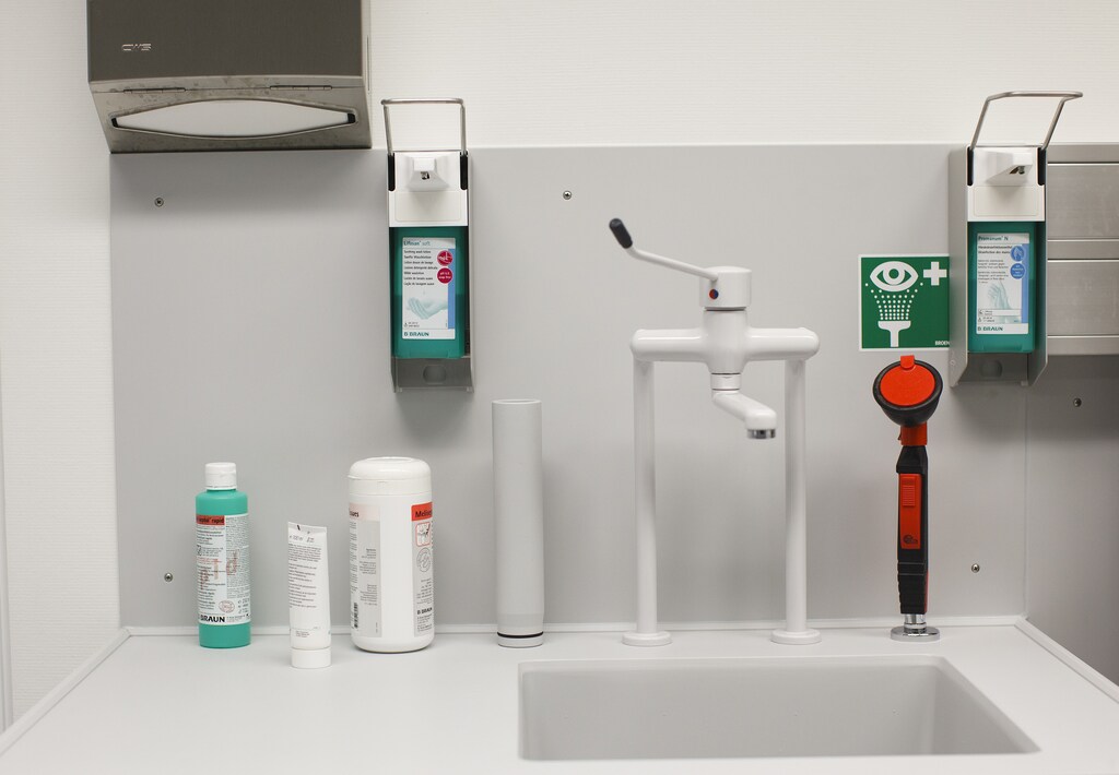 A washbowl and different soaps and disinfectants are pictured at the laboratory the hospital of the Canton of Nidwalden in Stans, October 27, 2011. Picture taken October 27, 2011. REUTERS/Michael Buholzer (SWITZERLAND) - BM2E7AS0TEI01