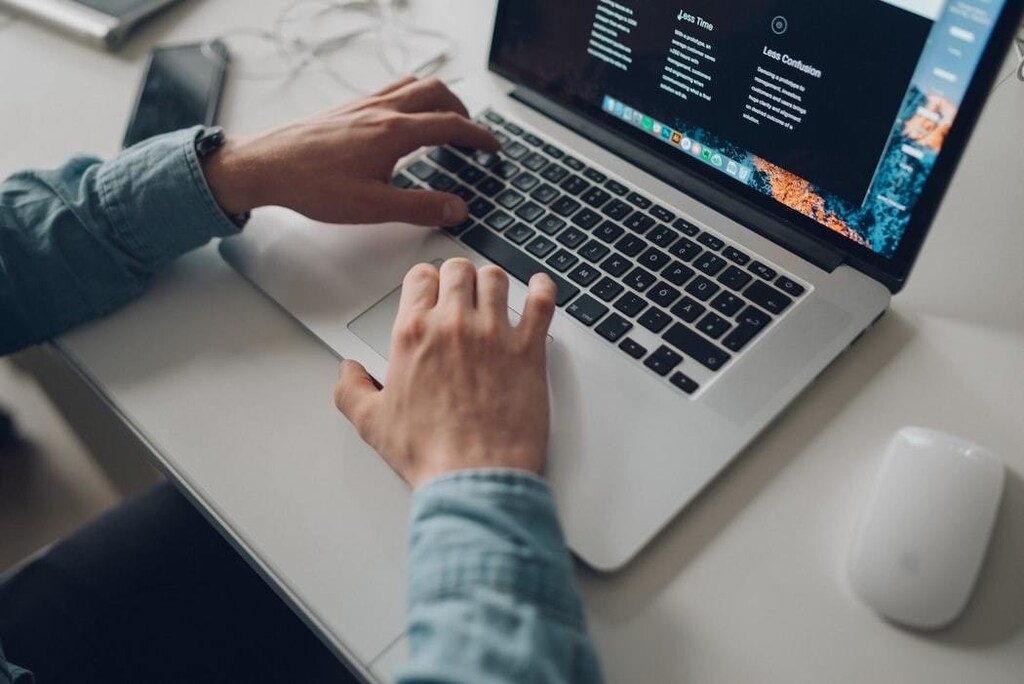 Image of a man using laptop