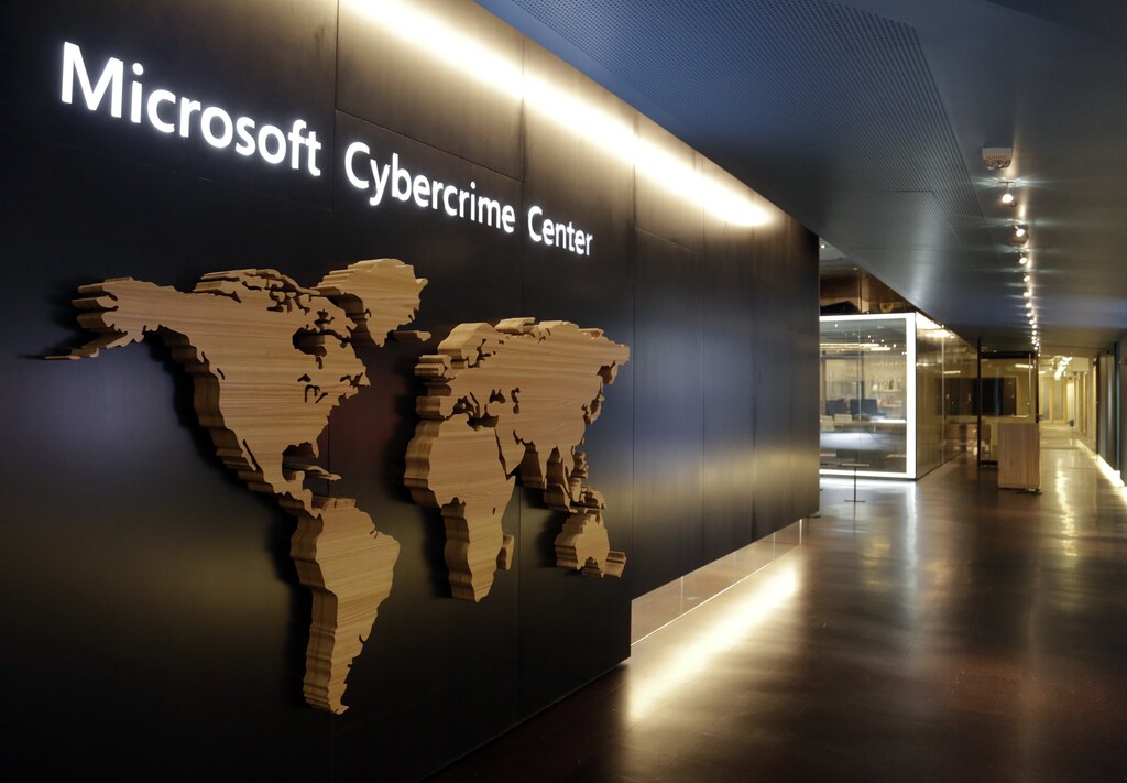 A sign is pictured in the hallway of the Microsoft Cybercrime Center, the new headquarters of the Microsoft Digital Crimes Unit, in Redmond, Washington November 11, 2013. Microsoft, the maker of the most popular computer operating system in the world is launching a new strategy against criminal hackers by bringing together security engineers, digital forensics experts and lawyers trained in fighting software pirates under one roof at its new Cybercrime Center. Picture taken November 11, 2013. To match Feature MICROSOFT-CYBERCRIME/ REUTERS/Jason Redmond (UNITED STATES - Tags: BUSINESS SCIENCE TECHNOLOGY CRIME LAW) - RTX15D4T