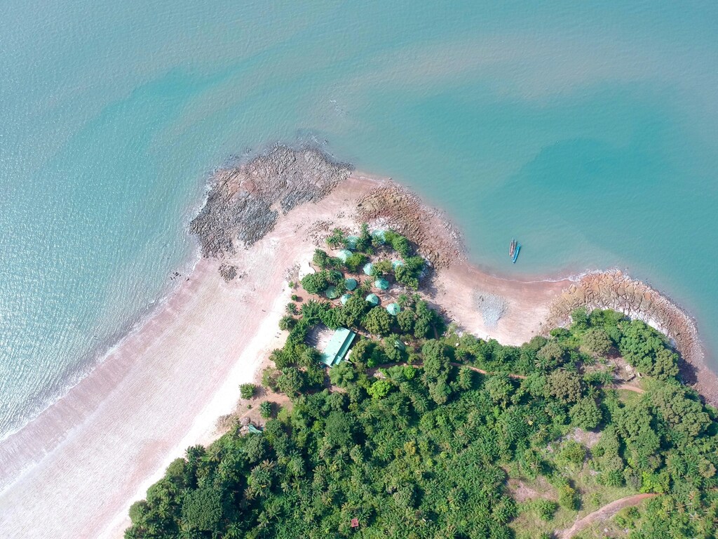 An aerial view of the coast of Guinea-Bissau. Caption: The impact of rising sea levels is becoming more apparent in Guinea-Bissau, driving residents into severe poverty.
