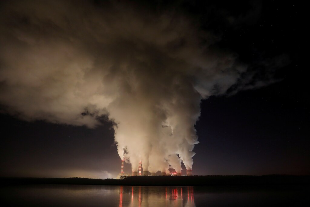 Smoke and steam billows from Belchatow Power Station, Europe's largest coal-fired power plant operated by PGE Group, at night near Belchatow, Poland December 5, 2018. Picture taken December 5, 2018.