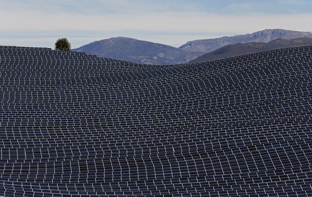 A general view shows solar panels to produce renewable energy at the photovoltaic park in Les Mees, in the department of Alpes-de-Haute-Provence, southern France March 31, 2015. The solar farm of the Colle des Mees, the biggest in France, consists of 112,780 solar modules covering an area of 200 hectares of land and representing 100 MW of power. REUTERS/Jean-Paul Pelissier TPX IMAGES OF THE DAY - RTR4VM4A