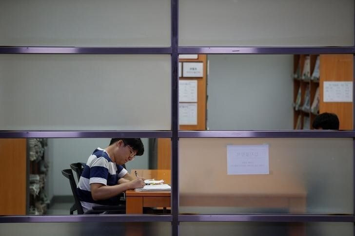 A student studies in Centennial Memorial Samsung Hall at the Korea University in Seoul, South Korea, August 1, 2016. REUTERS/Kim Hong-Ji AUNI