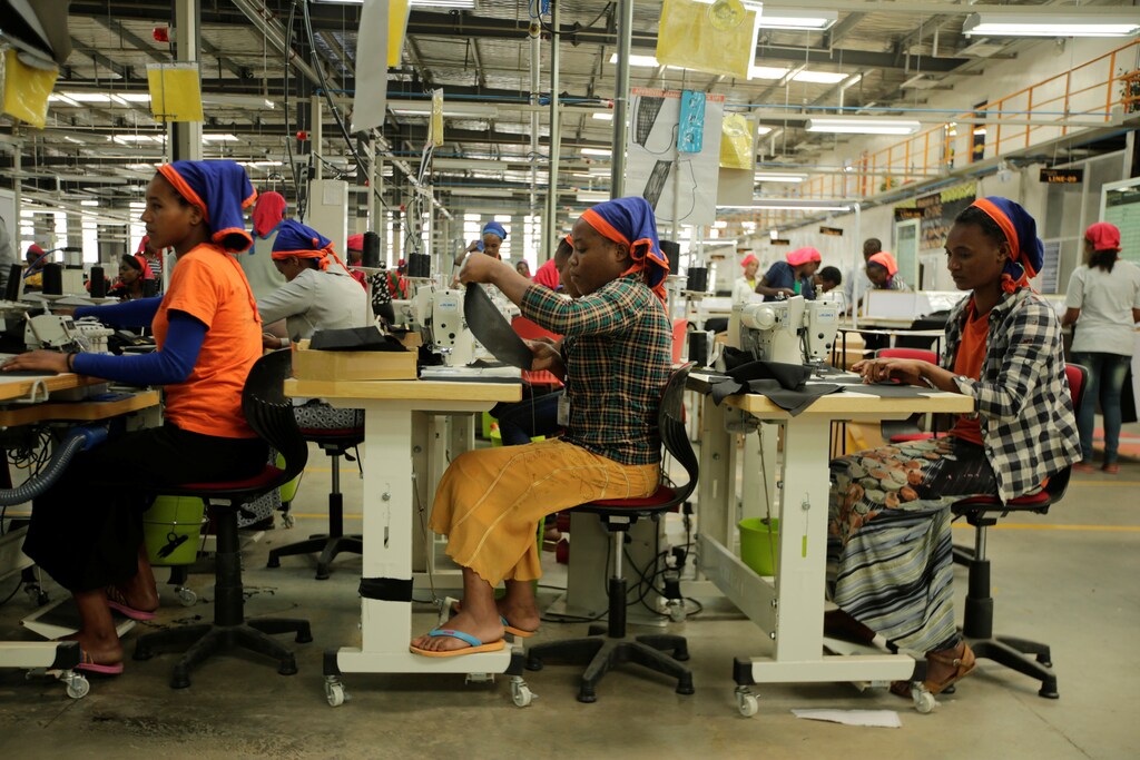 Workers sew clothes in Hawassa industrial park, one of five new facilities that have created 45,000 new jobs in Ethiopia.