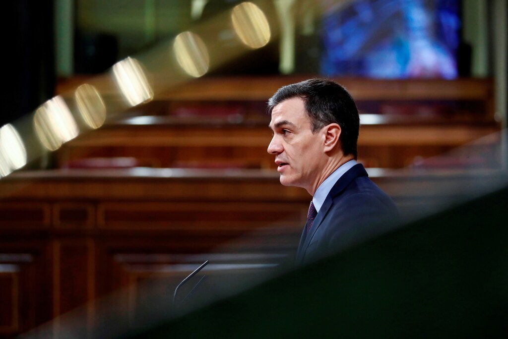 Spanish Prime Minister Pedro Sanchez speaks on coronavirus disease (COVID-19) at Parliament in Madrid, Spain, March 18, 2020. Mariscal/Pool via REUTERS - RC28MF9T08HH