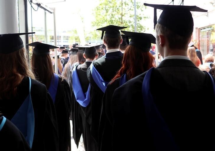 Warwick University graduates on the day of their graduation ceremony in Warwick, Britain July 17, 2017. Picture taken July 17, 2017. REUTERS/Russell Boyce