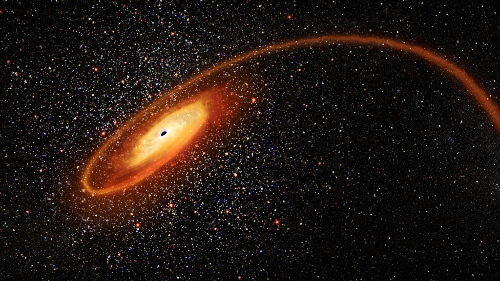 A cosmic homicide in action, with a wayward star being shredded by the intense gravitational pull of a black hole that contains tens of thousands of solar masses in an artist's impression obtained by Reuters April 2, 2020. NASA-ESA/D. Player/Handout via REUTERS TPX IMAGES OF THE DAY. THIS IMAGE HAS BEEN SUPPLIED BY A THIRD PARTY - RC2KWF97PDL5