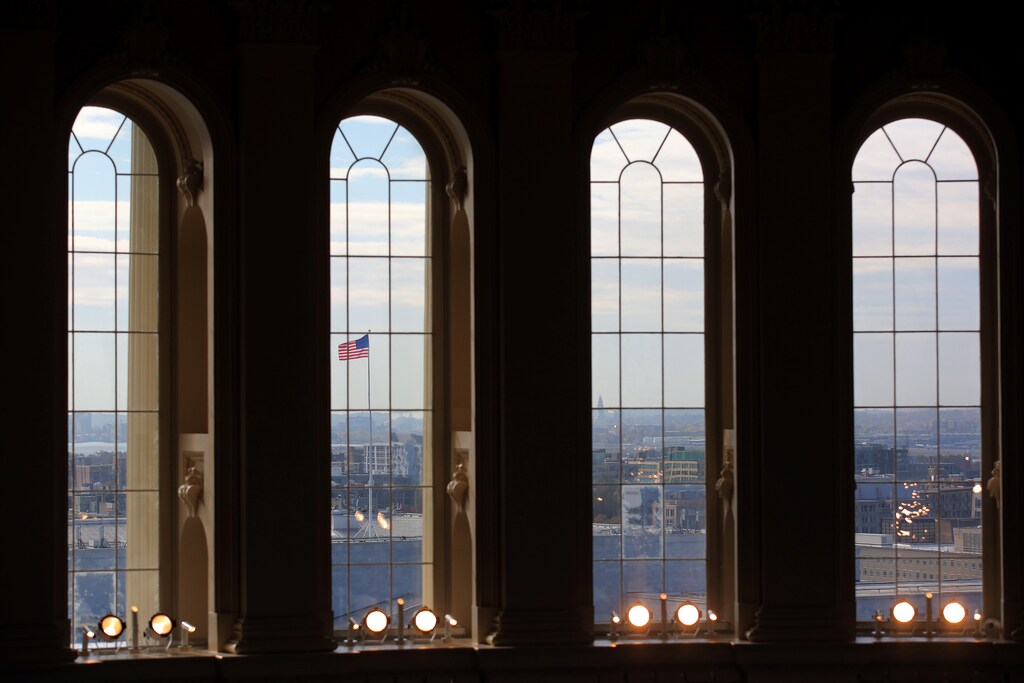 A U.S. flag is seen from the rebuilt cast-iron dome of the U.S. Capitol, which was formally completed on Tuesday on time for the inauguration of President-elect Donald Trump during a media tour in Washington, U.S., November 15, 2016. REUTERS/Carlos Barria - RTX2TTTI