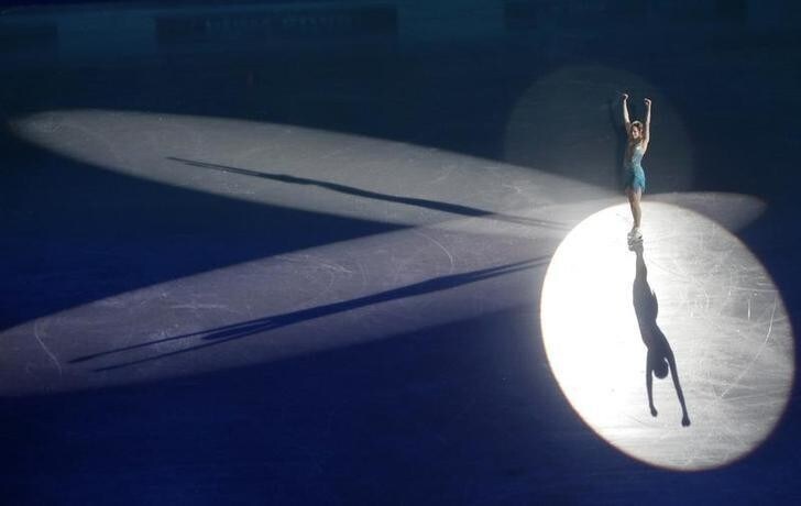 Carolina Kostner of Italy reacts after winning gold medal at the European Figure Skating Championships in Tallinn, January 23, 2010. REUTERS/Ints Kalnins (ESTONIA - Tags: SPORT FIGURE SKATING IMAGES OF THE DAY)