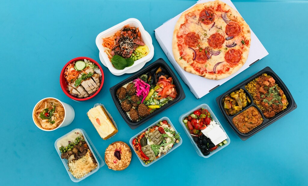 Various foods in plastic packaging: Pizza boxes, fast food wrappers and microwave popcorn bags all rely on PFAS to prevent sogginess and extend shelf life.