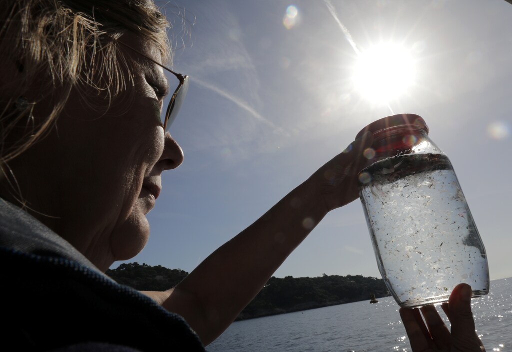 Maria-Luiza Pedrotti, CNRS marine biologist specialized in micro-plastics, looks at sea sample taken from the Mediterranean Sea on a coastal research vessel as part of a scientific study about microplastics damaging marine ecosystems, near Villefranche-Sur-Mer, on the French Riviera, France, October 19, 2018.