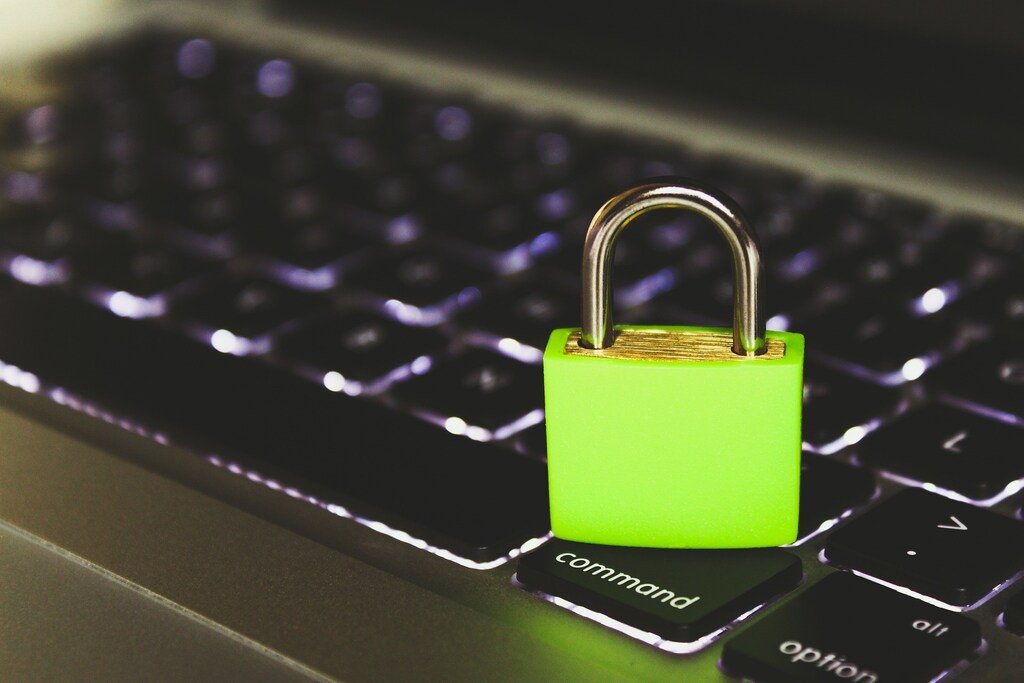 Padlock on laptop keyboard
